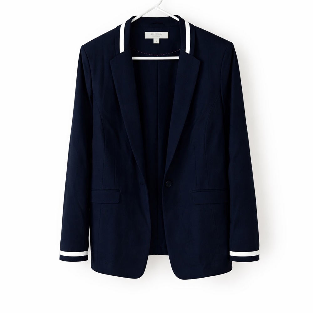Rare and chic. Classic Navy Blazer with White Accents